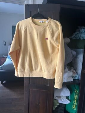 Levi's Women's Crewneck Sweatshirt in Soft Yellow with Red Logo